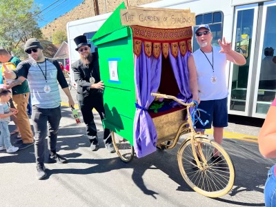 people having fun racing outhouse