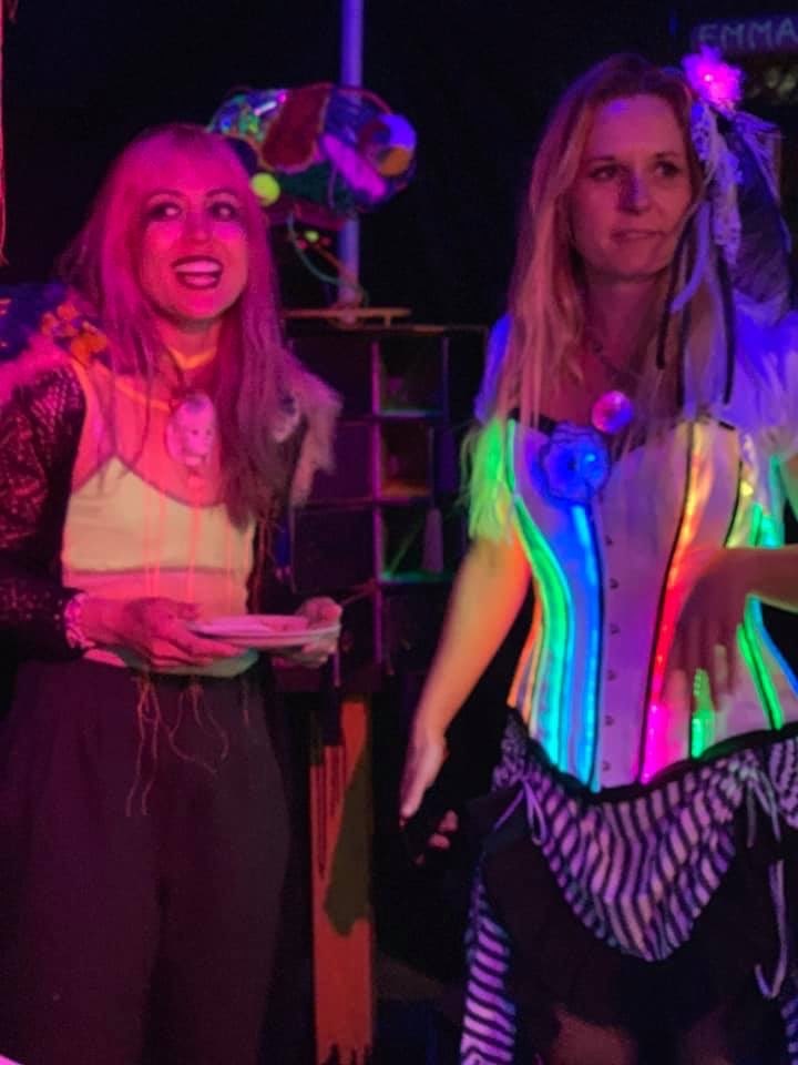 emmalou ras in mood light at upcycle event with friend